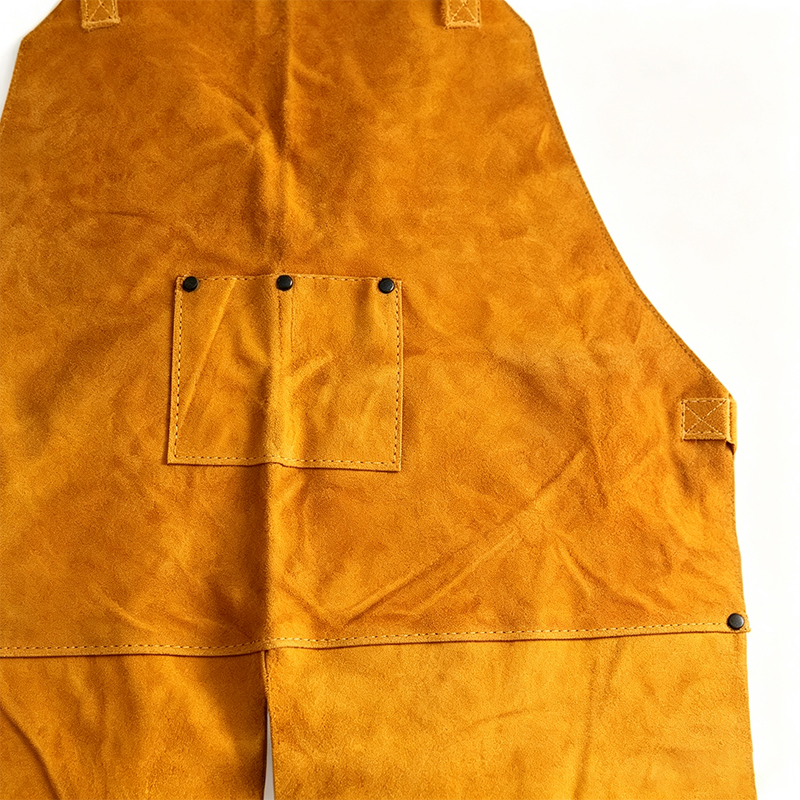 Pantalon tablier de travail en cuir à jambe fendue sur le devant et simple